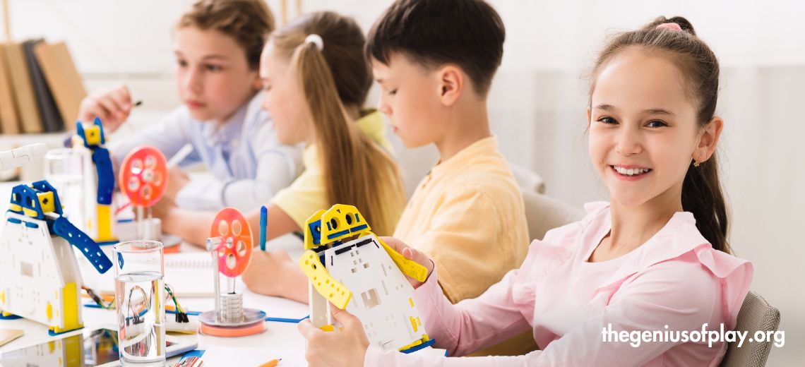 elementary aged school girl and classmates working on circuits in a classroom environment 