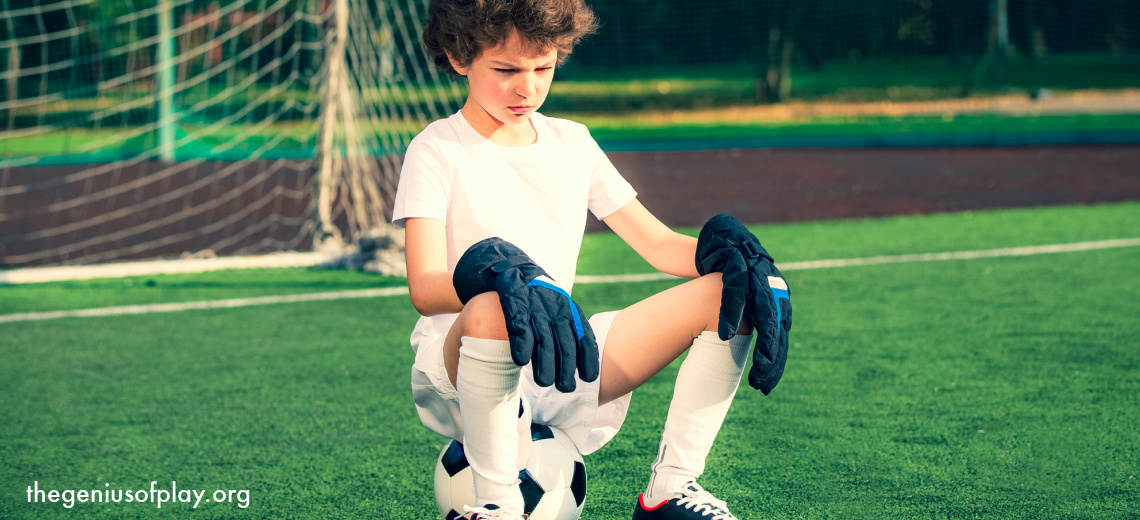 Pre teen boy disappointed with soccer game loss