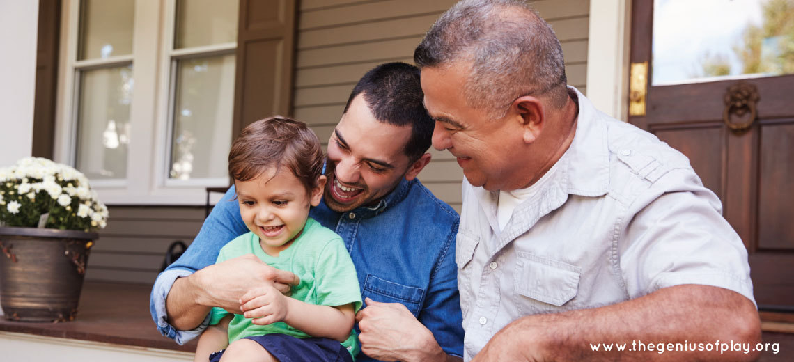 dad, grandpa and young boy sitting together